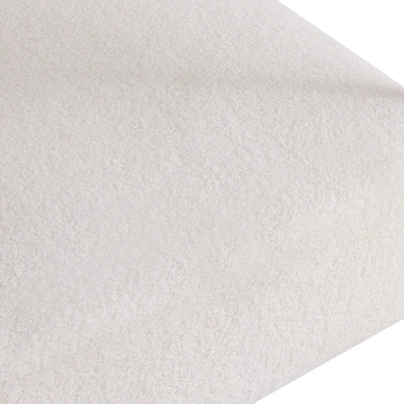 Poltrona d'accento moderna rivestita in tessuto Bouclé, poltrona curva con struttura in metallo nero